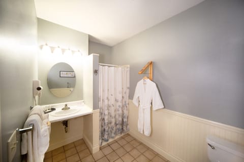 Shower, eco-friendly toiletries, hair dryer, bathrobes