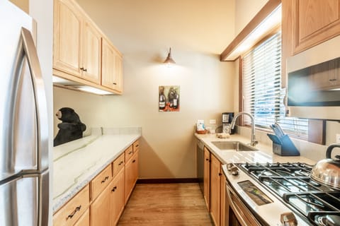 Condo, 2 Bedrooms | Private kitchen | Fridge, microwave, oven, dishwasher