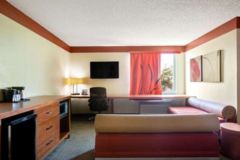 Suite, 1 Bedroom, Non Smoking (1 King Bed) | Pillowtop beds, desk, iron/ironing board, free cribs/infant beds