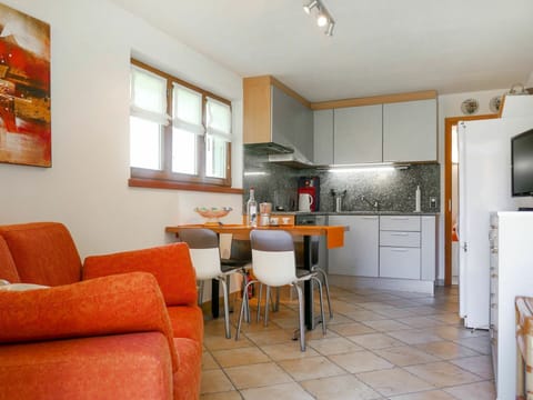 Furniture, Cabinetry, Countertop, Kitchen Appliance, Kitchen Stove, Window, Couch, Wood, Chair, Lighting