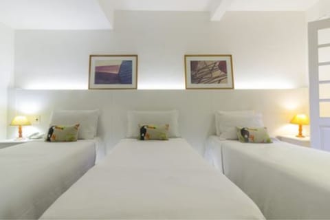 Standard Triple Room | Minibar, in-room safe, free WiFi, bed sheets