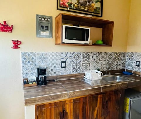 Senior Double Room | Private kitchenette | Mini-fridge, microwave, coffee/tea maker, cookware/dishes/utensils