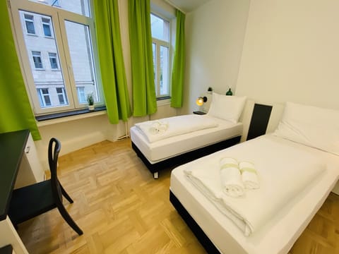 Twin Room | Hypo-allergenic bedding, desk, free WiFi, bed sheets