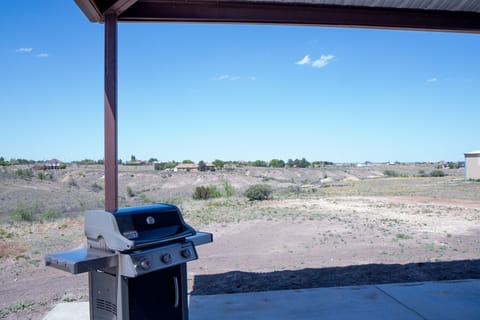 Patio view with a propane grill