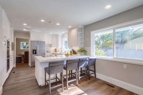 Beautifully Upgraded Kitchen with Stainless Steel Appliances view 3 - looking into Dining Room