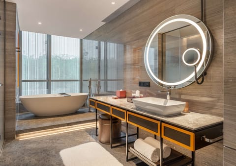 Chic Premium Room | Bathroom | Separate tub and shower, rainfall showerhead, designer toiletries