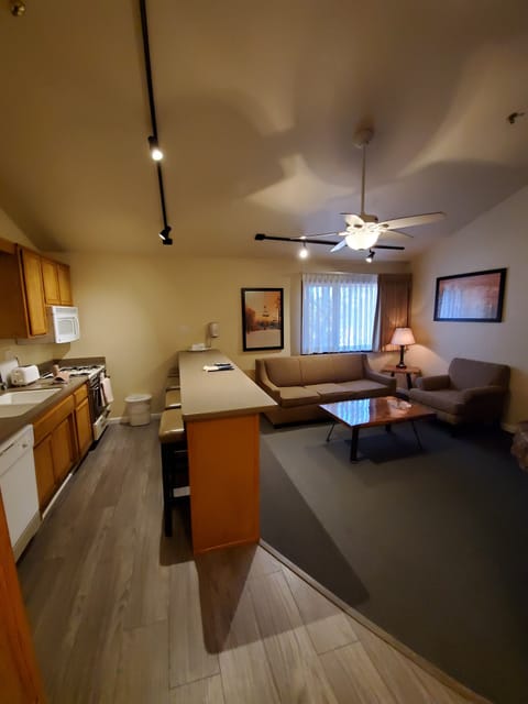 1 Bedroom, King Suite | Private kitchen | Full-size fridge, microwave, stovetop, dishwasher