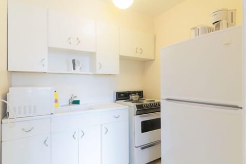 Triple Room | Private kitchen | Fridge, microwave, coffee/tea maker