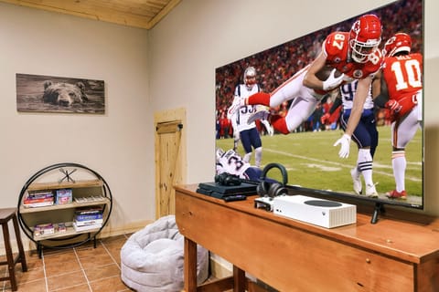 Rainy day, no problem. The cabin has a brand NEW XBOX Series E console, PS3 and lots of games.