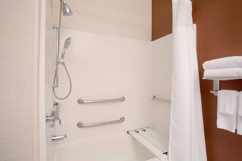 Room, 1 King Bed | Bathroom | Combined shower/tub, deep soaking tub, designer toiletries, hair dryer