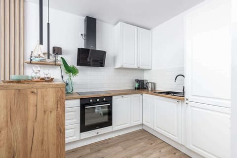 Modern, fully equipped kitchenette.