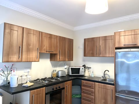 Apartment | Private kitchen | Fridge, microwave, oven, stovetop