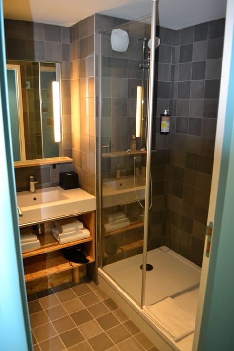 Shower, eco-friendly toiletries, hair dryer, towels