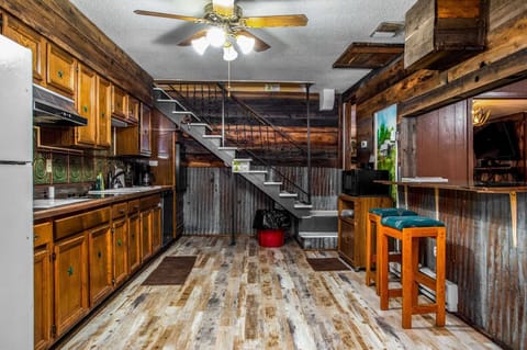 The combination of modern and nostalgic craftsmanship creates an atmosphere that's both spacious and cozy.