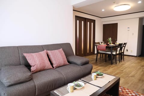 Apartment, Non Smoking (405) | Living area | 40-inch LCD TV with digital channels, TV