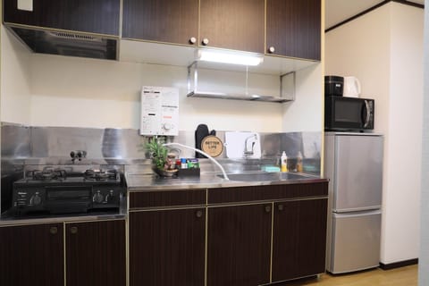 Apartment, Non Smoking (402) | Private kitchenette | Fridge, microwave, electric kettle, rice cooker