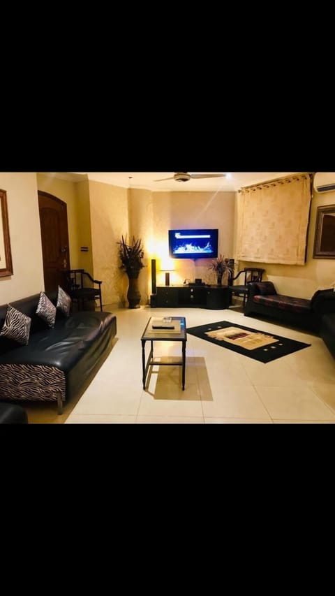 Apartment | Living area | 30-inch TV with digital channels