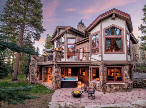 Hot tub and fire pit on the patio.
