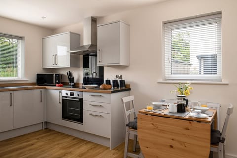 Drop leaf dining table with 4 chairs