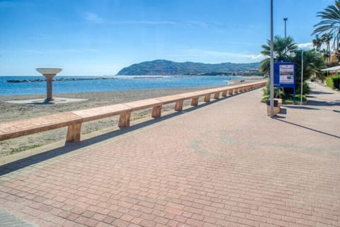 On the beach, black sand