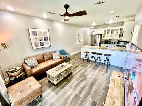 Unit 102 Comfortable living room adjacent to kitchen