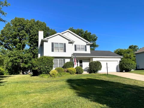 Outside, two-stall garage, ample parking in driveway and street