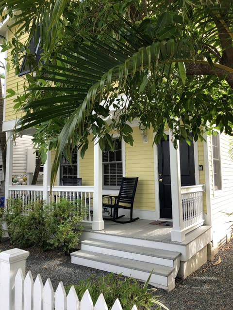 Front porch of home. Front door is for entrance to the upper unit.