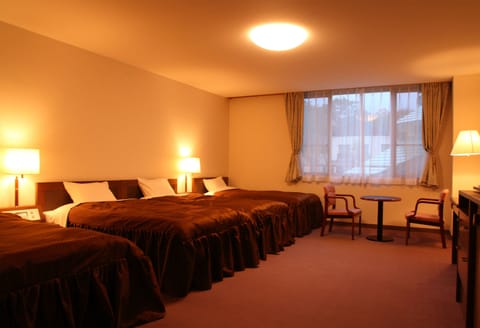 Triple Room, Non Smoking | In-room safe, desk, blackout drapes, free WiFi