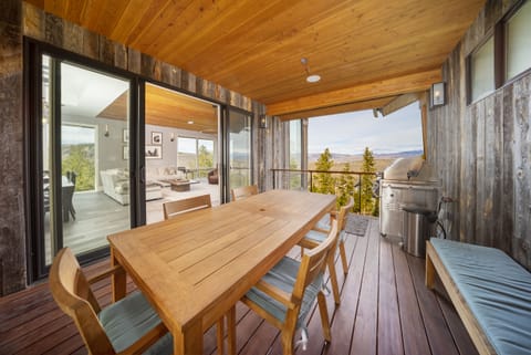 Enjoy the great views while grilling and dining on the covered deck