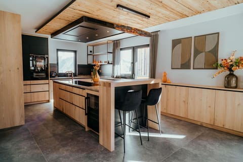 Chalet Ladis | Private kitchen | Espresso maker, highchair