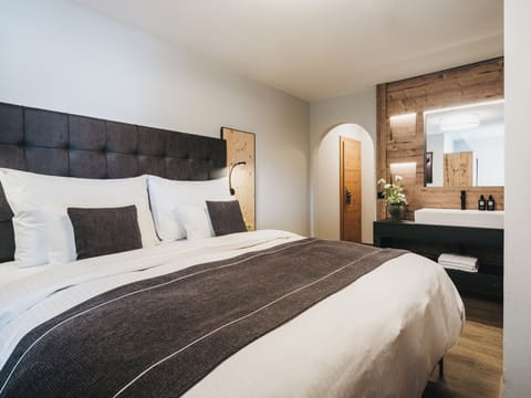 Suite, 2 Bedrooms | Desk, laptop workspace, soundproofing, free WiFi