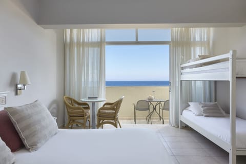 Family Room Sea View | Blackout drapes, free cribs/infant beds, free WiFi, bed sheets