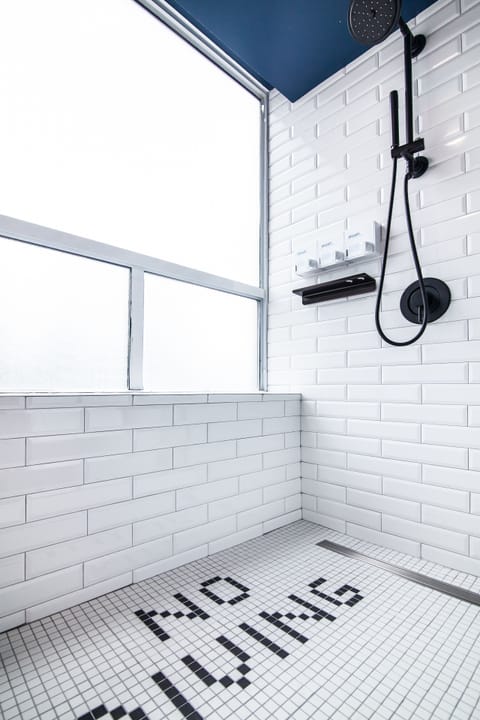 Shower, rainfall showerhead, eco-friendly toiletries, hair dryer