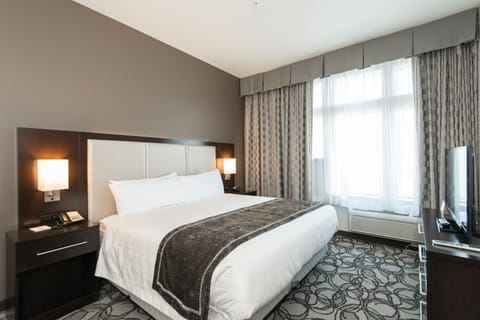 Casino Suite, 1 King Bed, Lake View | Desk, iron/ironing board, free WiFi, bed sheets