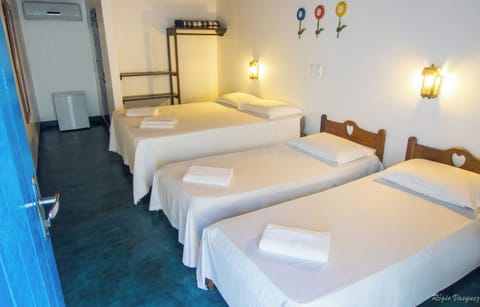 Standard Quadruple Room | Minibar, free WiFi, bed sheets