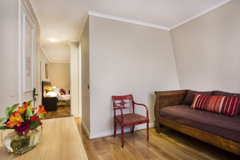 Junior Suite, 1 Queen Bed | In-room safe, desk, free cribs/infant beds, rollaway beds