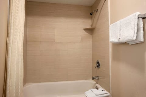 Separate tub and shower, free toiletries, hair dryer, towels