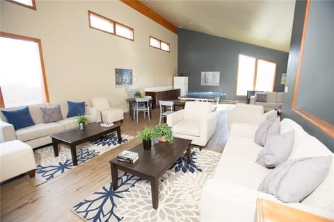 Community event room at clubhouse with foosball and ping pong table!