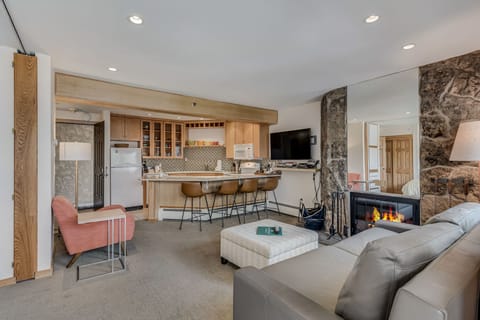 Living room with wood-burning fireplace