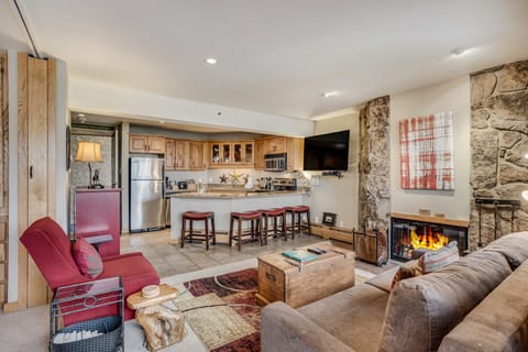 Living room with wood-burning fireplace