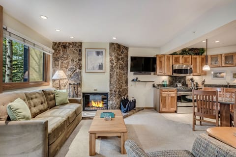 Living room with wood-burning fireplace