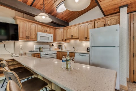 Full kitchen with bar seating