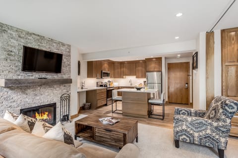 Living room with wood-burning fireplace