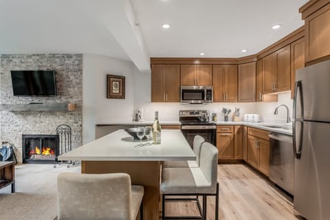Fully remodeled kitchen with island dining