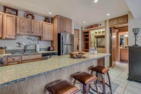 Full kitchen with bar seating