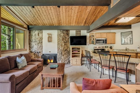 Living room with wood-burning fireplace