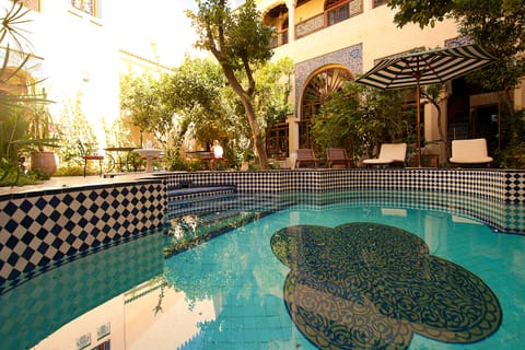 Seasonal outdoor pool, pool umbrellas