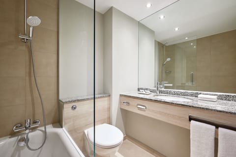 Combined shower/tub, deep soaking tub, free toiletries, hair dryer