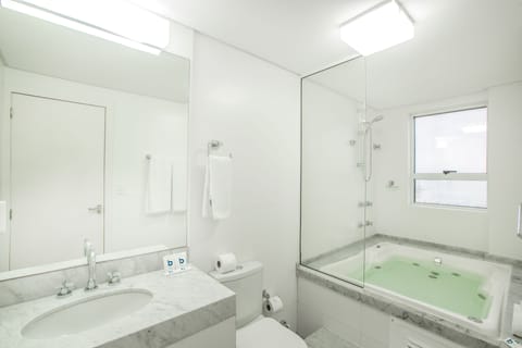 Premium Suite, Hot Tub, Ocean View | Bathroom | Shower, hair dryer, towels