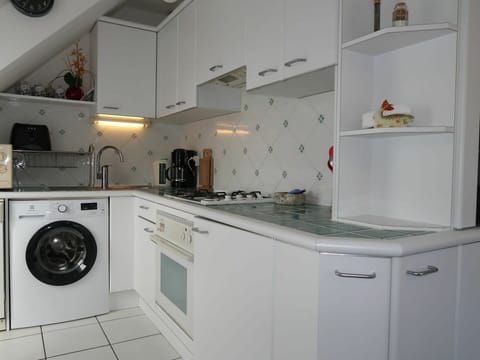 Cabinetry, Laundry Room, Clothes Dryer, Washing Machine, Kitchen Appliance, Kitchen Stove, Home Appliance, Countertop, Kitchen, Interior Design